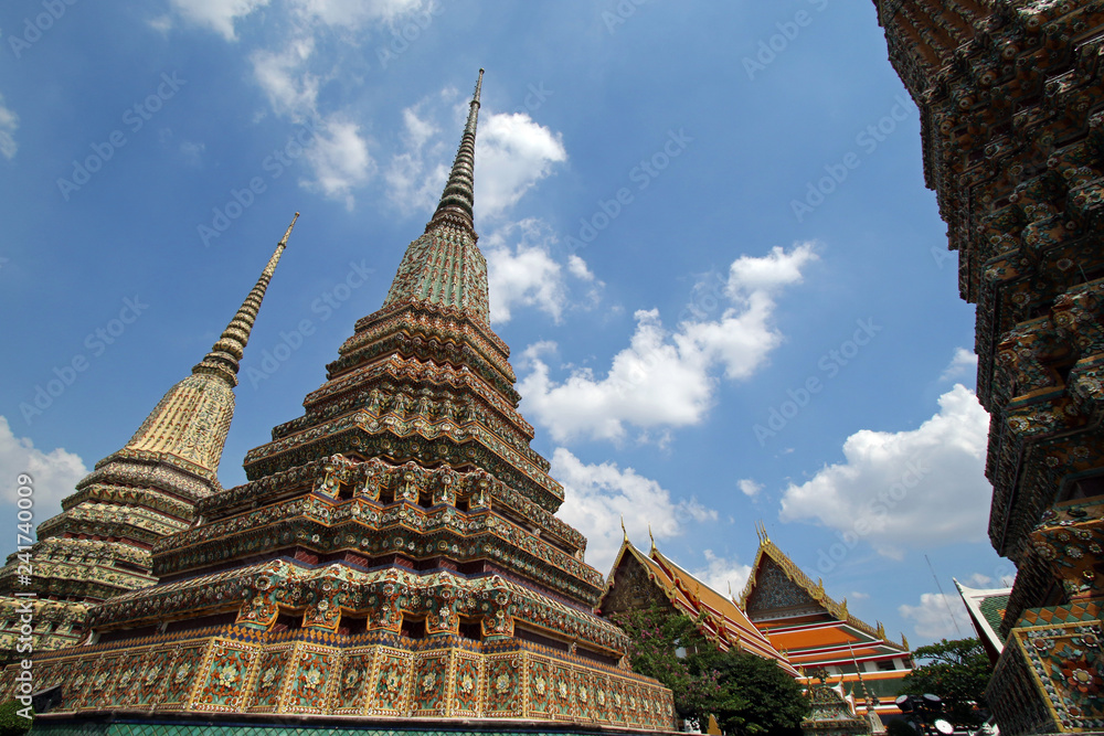 Fototapeta premium Phra Maha Chedi Si Rajakarn, group of four large stupas in Wat Pho temple complex, Bangkok