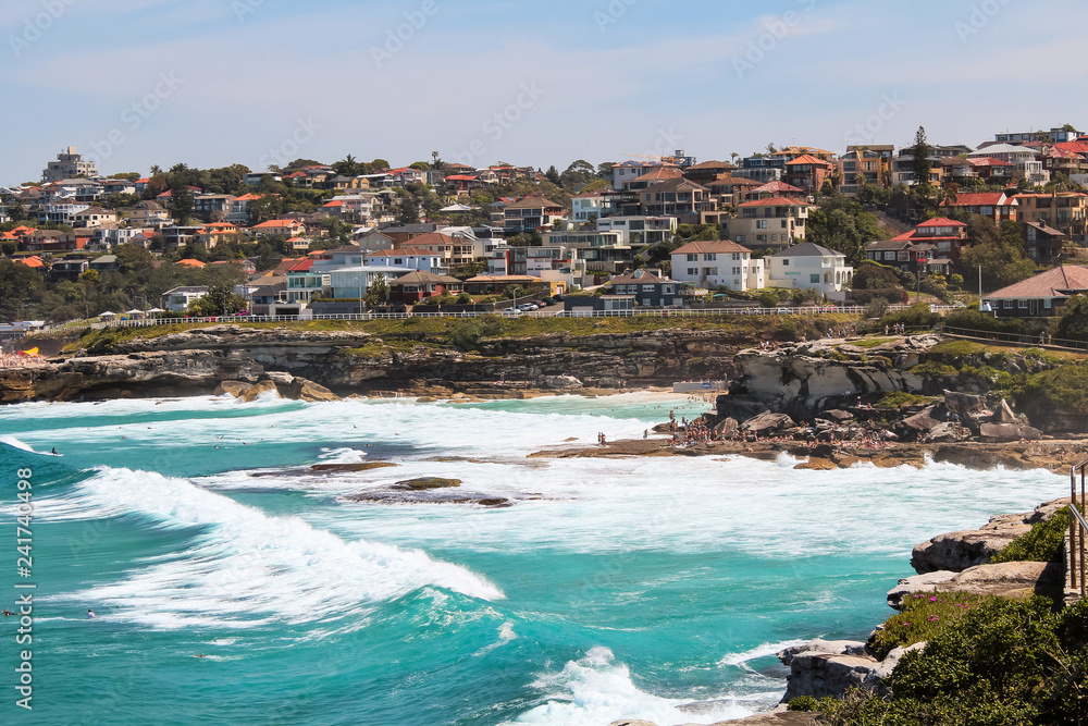 Close view onto Tamarama and Bronte beach seen from Mackenzies Point in summer on the Bondi to Coogee beach walk (Sydney, New South Wales, Australia)