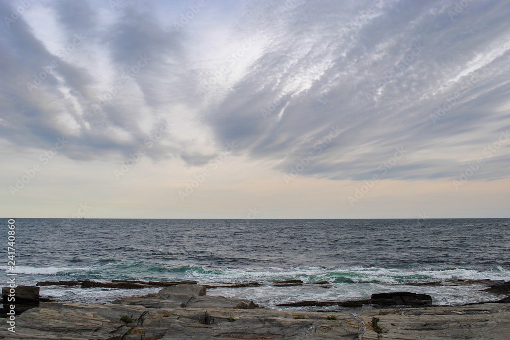 Beautiful panorama of rocky coast of Atlantic Ocean and cloudy sky Beautiful panorama of rocky coast of Atlantic Ocean and cloudy sky