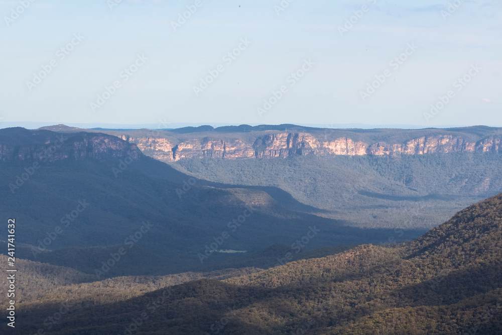 View of the Blue Mountains from the lookout of the Three Sisters on a calm and clear afternoon near Sydney (Sydney, New South Wales, Australia)