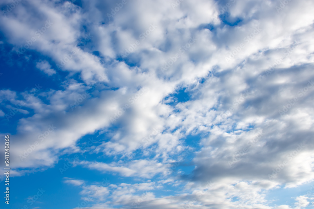 The beauty of the sky with clouds and the sun. The beauty of the sky with clouds and the sun.