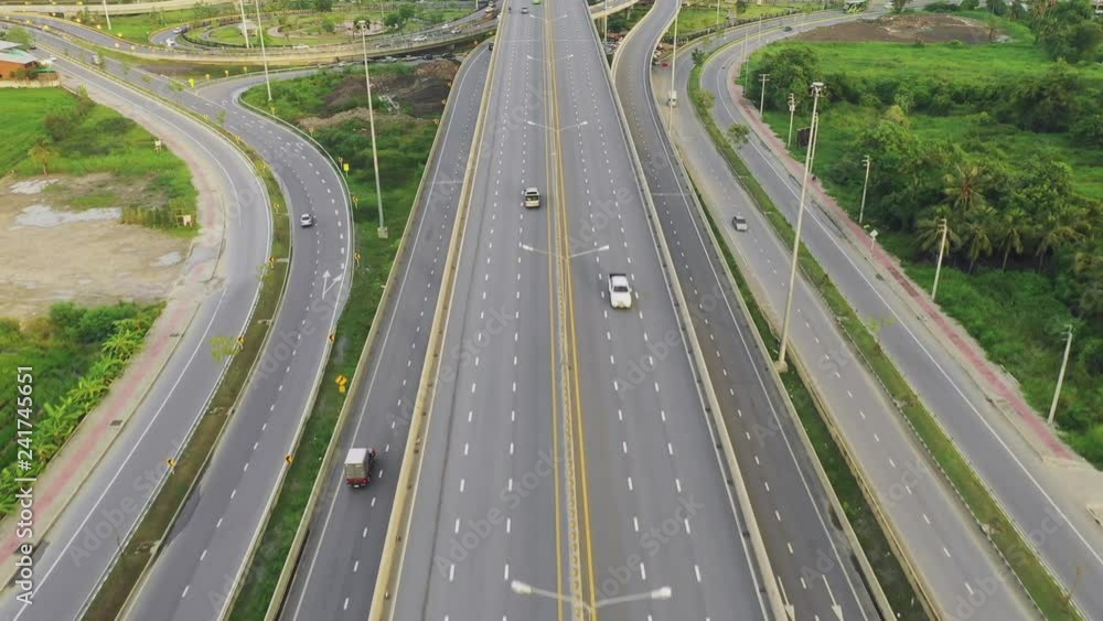 day scene of Fly up over huge big roundabout of multiple lane highway infinity shape of road in Bangkok City, Thailand, 4k video day scene of Fly up over huge big roundabout of multiple lane highway infinity shape of road in Bangkok City, Thailand, 4k video
