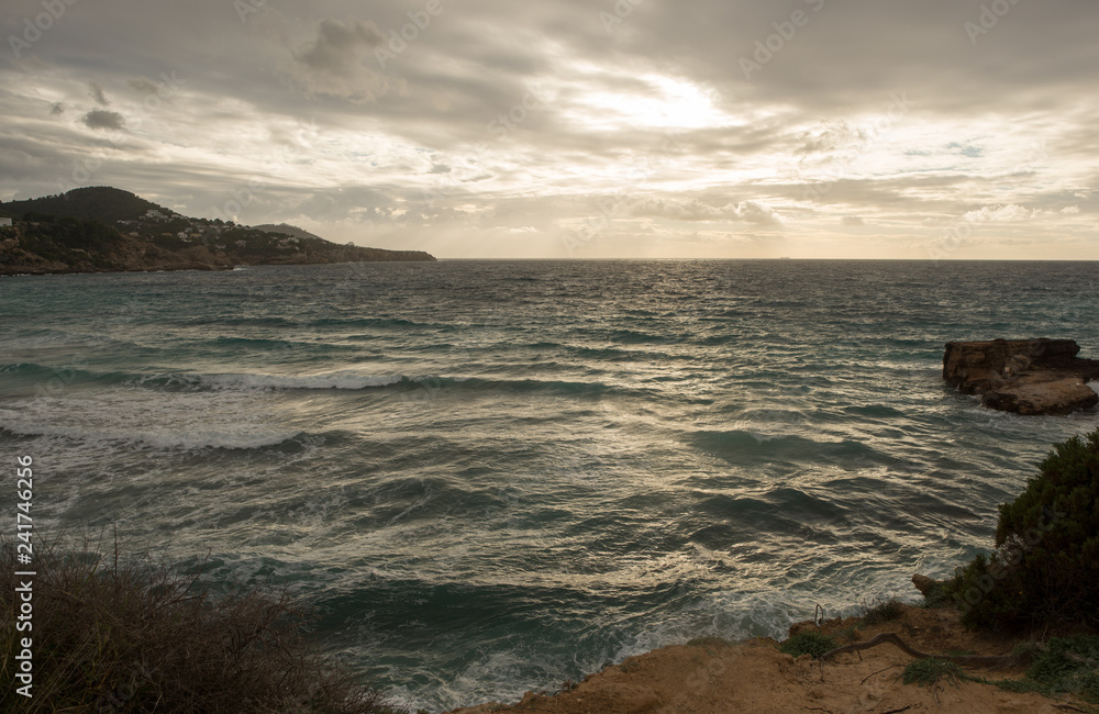 Cove in San Antonio de Ibiza a cloudy day