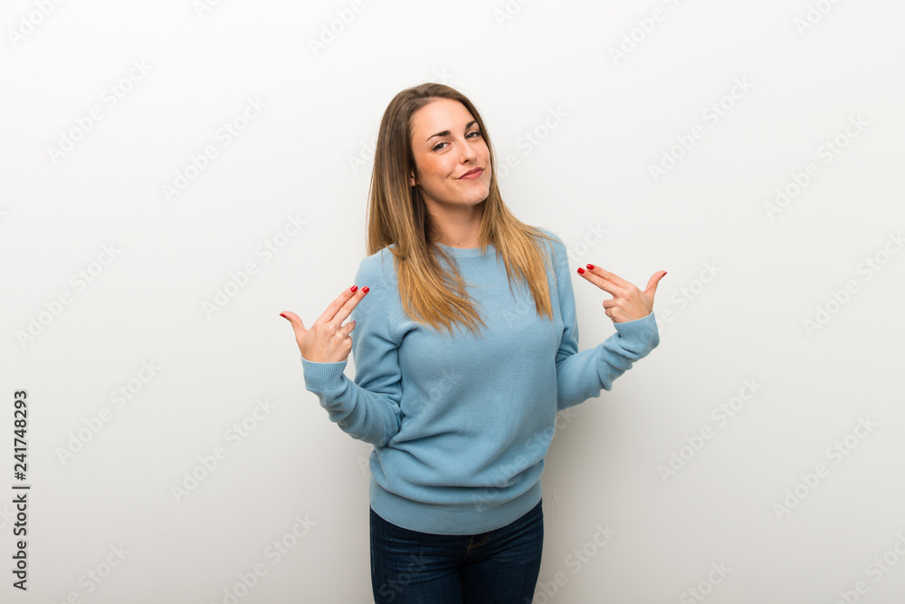 Blonde woman on isolated white background proud and self-satisfied in love yourself concept Blonde woman on isolated white background proud and self-satisfied in love yourself concept