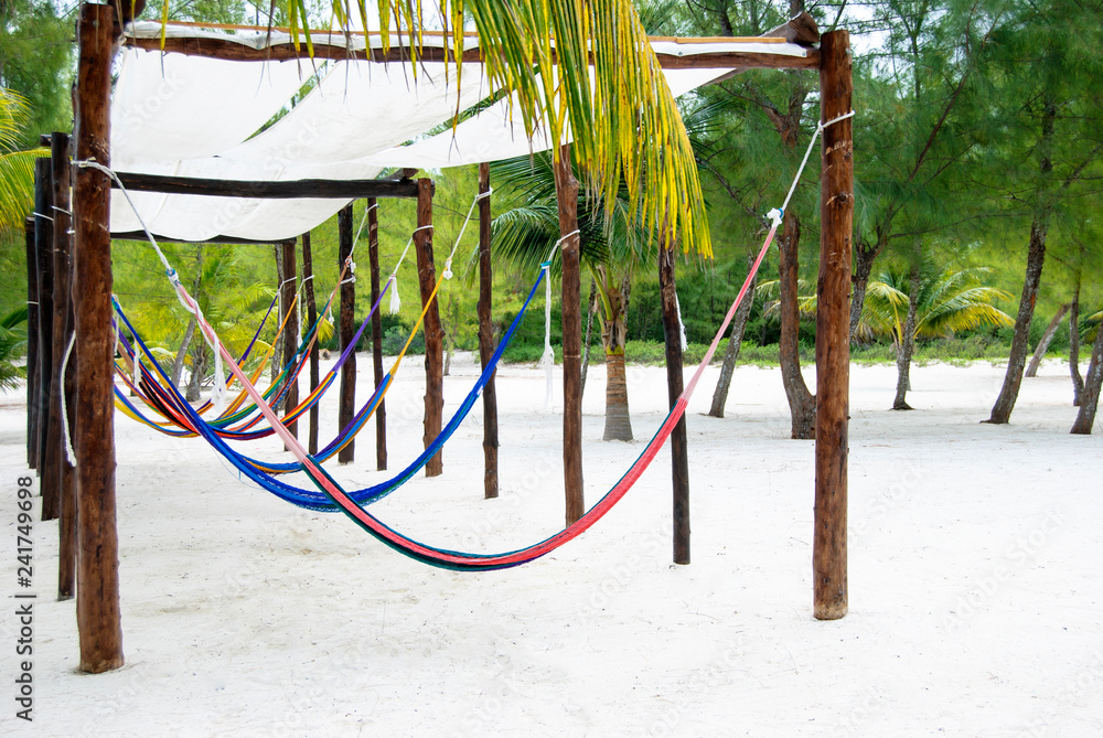 Fototapeta premium Colorful Hammocks waiting for the vacationers. 