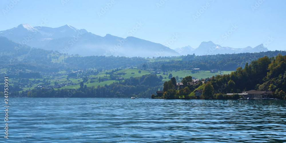 Panorama view of Lake Thun in the Bernese Oberland region in Switzerland. Panorama view of Lake Thun in the Bernese Oberland region in Switzerland.