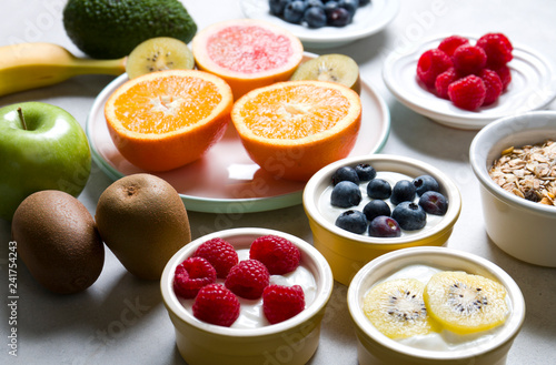 Healthy eating. Composition of fresh fruit with natural yoghurt.