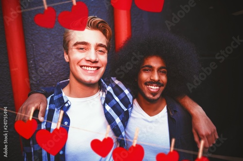 Composite image of hearts hanging on a line photo