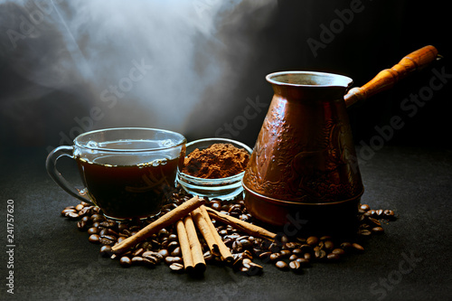 Canvas Print cup of coffee with cinnamon sticks