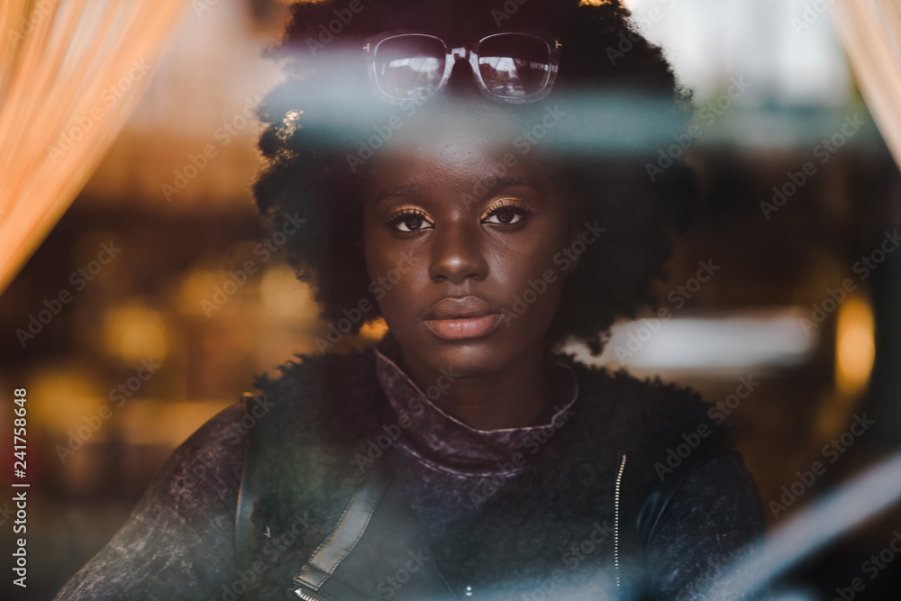 Portrait of girl looking through window Portrait of girl looking through window