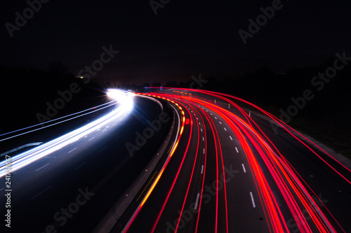 Car lights in a night background, long exposition