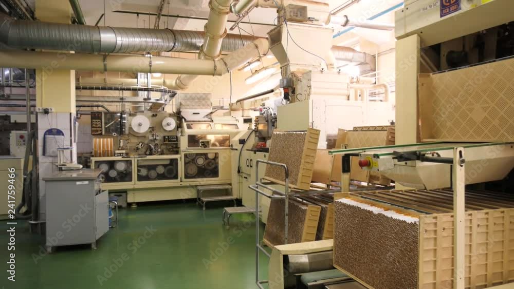 The line for the production of cigarettes and tobacco products, which are sorted and sent for packaging. Packing in bundles and boxes. The line for the production of cigarettes and tobacco products, which are sorted and sent for packaging. Packing in bundles and boxes.