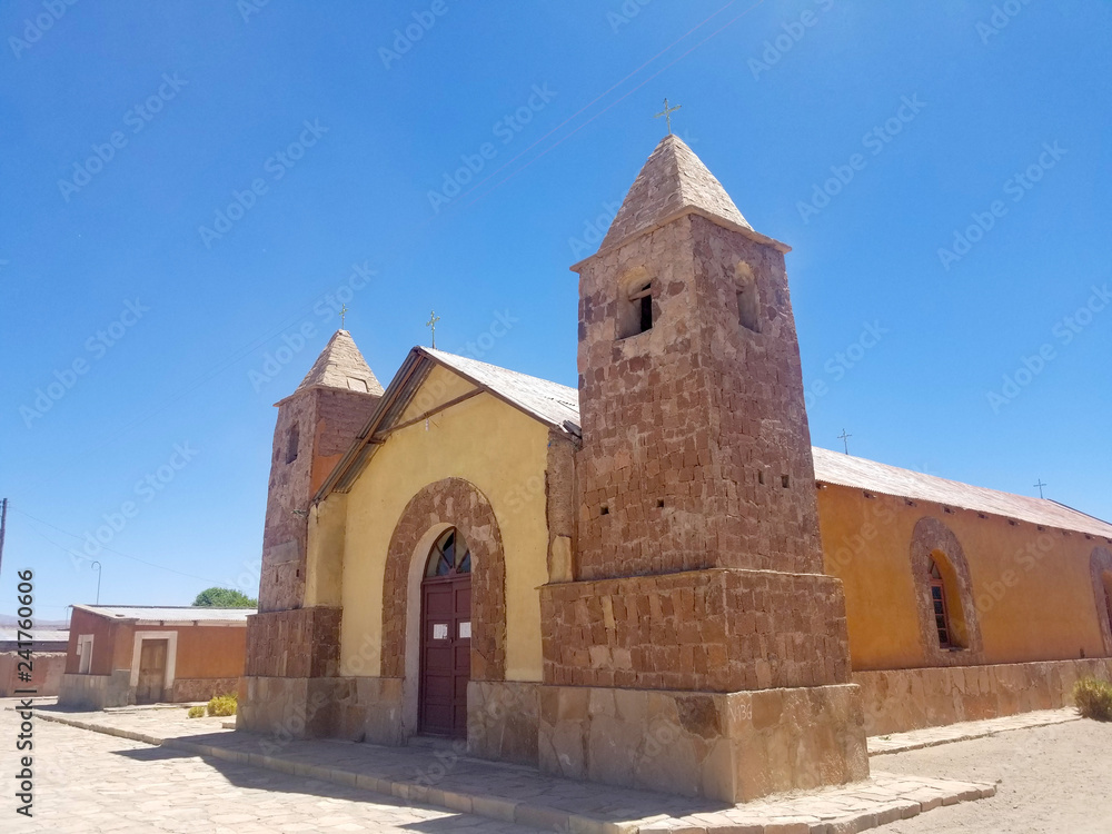 Old church in a village in South America, constructed with clay bricks and mud.