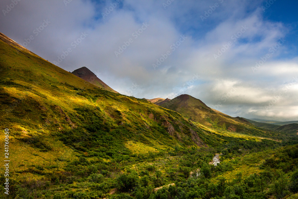 Denali National Park, Alaska: Landscape of clouds and river near Cathedral Mountain. Denali National Park, Alaska: Landscape of clouds and river near Cathedral Mountain.