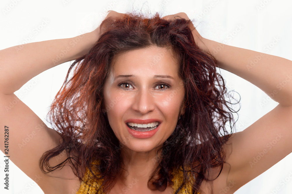 Fototapeta premium desperate woman pulling her hair