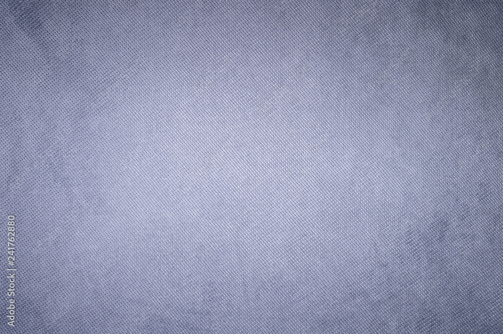 Fototapeta premium Textured background surface of textile upholstery furniture close-up. Violet Color fabric structure