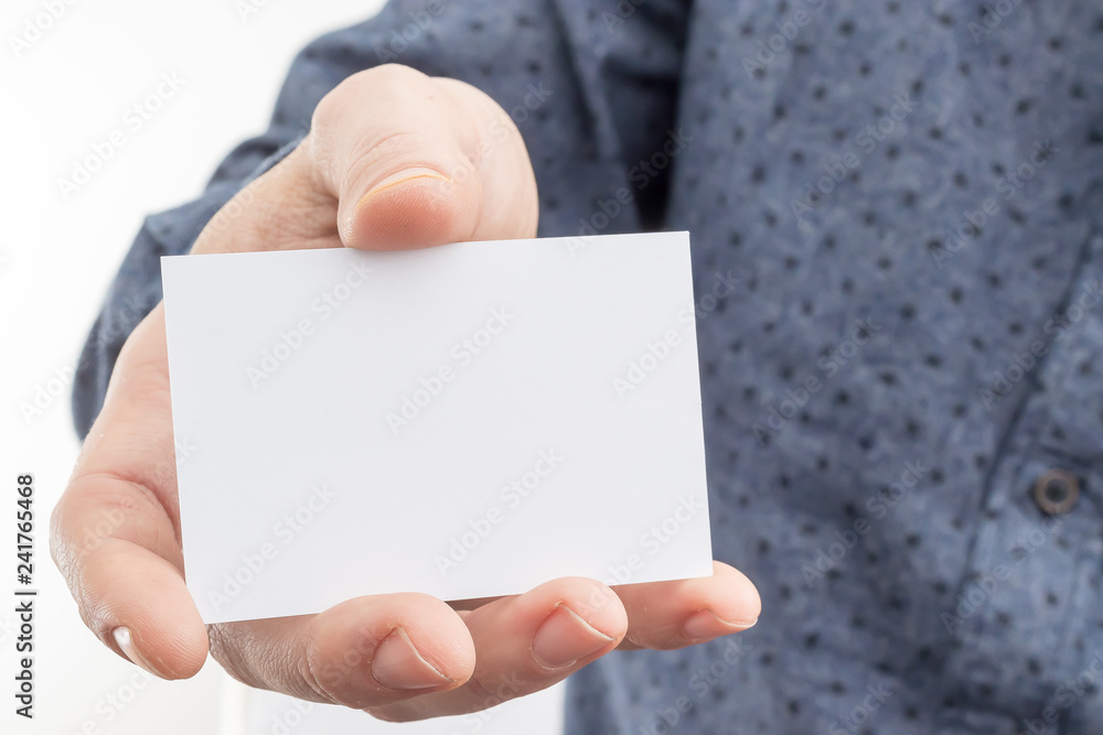 Business man holding a business card Business man holding a business card
