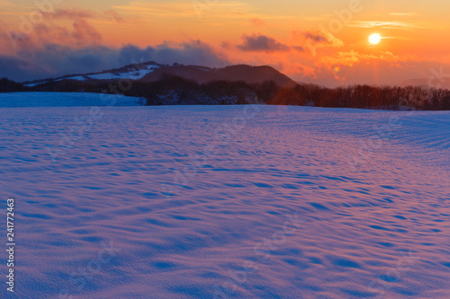 Frosty sunset in the mounta...
