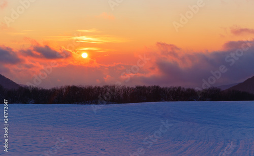 Frosty sunset in the mountains in winter © alexmu
