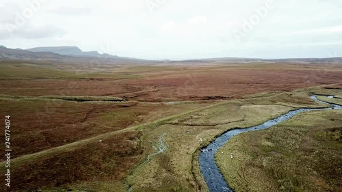 Flying over the River Lealt and Single track at Loch Cuithir and Sgurr a Mhadaidh Ruadh - Hill of the Red Fox, Isle of Skye, Scotland photo