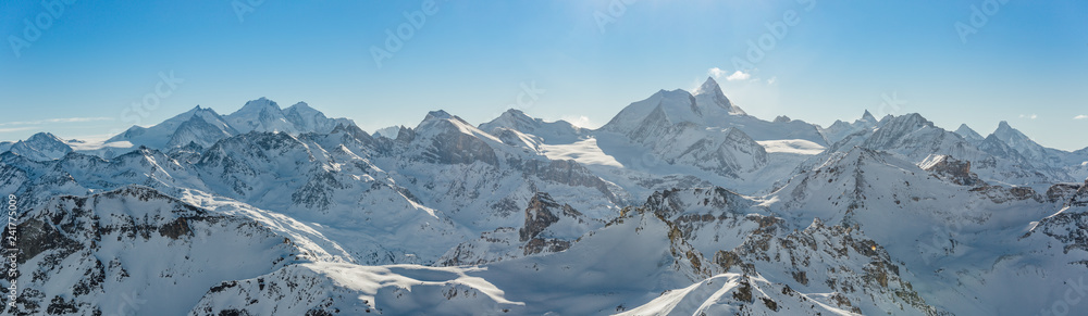 Panorama of the Weisshorn and surrounding mountains in the swiss alps.