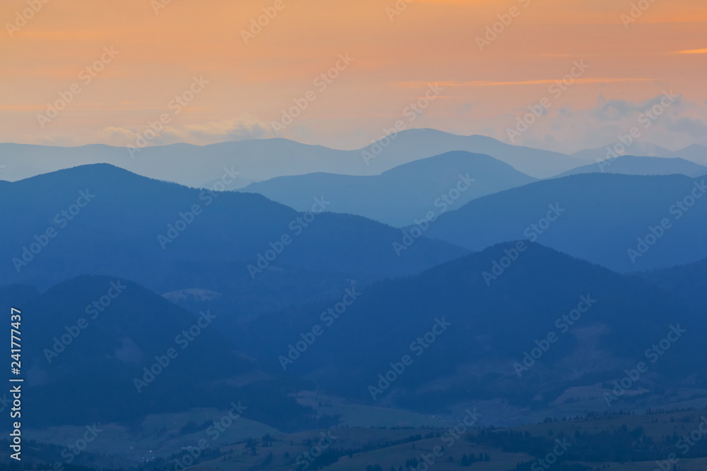 mountain landscape, mountain ridge in a blue mist