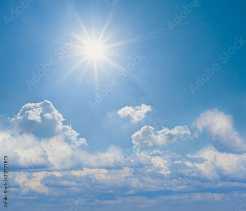 sparkle sun on a cloudy sky background