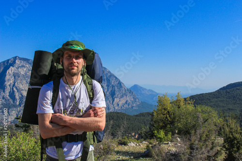 man tourist on Lycian trail in Turkey, forest and mountains