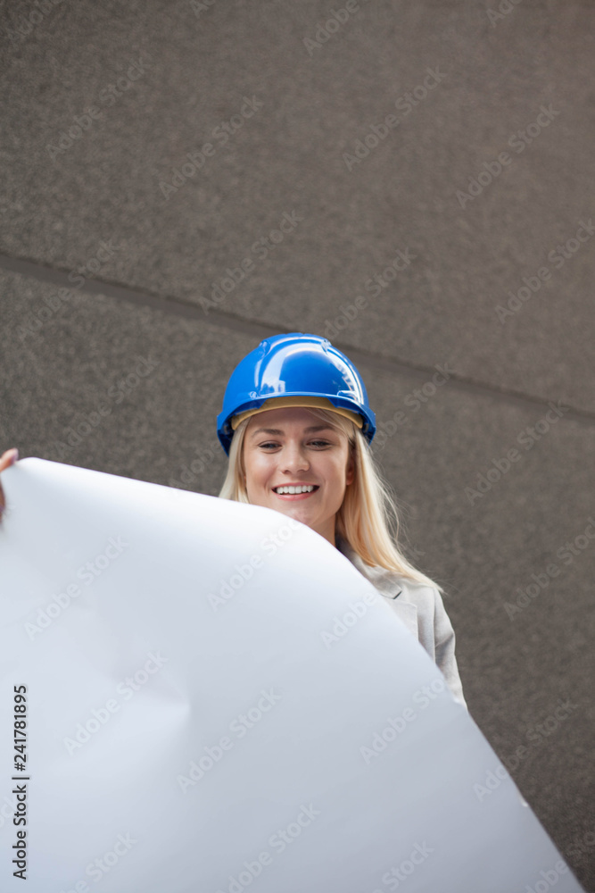 Attractive smiling female engineer.