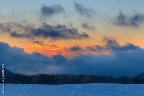 Frosty sunset in the mounta...