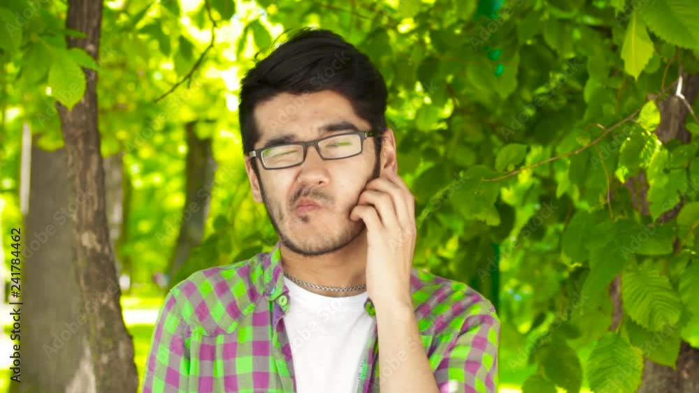 Set of different emotions from asian man Set of different emotions from asian man