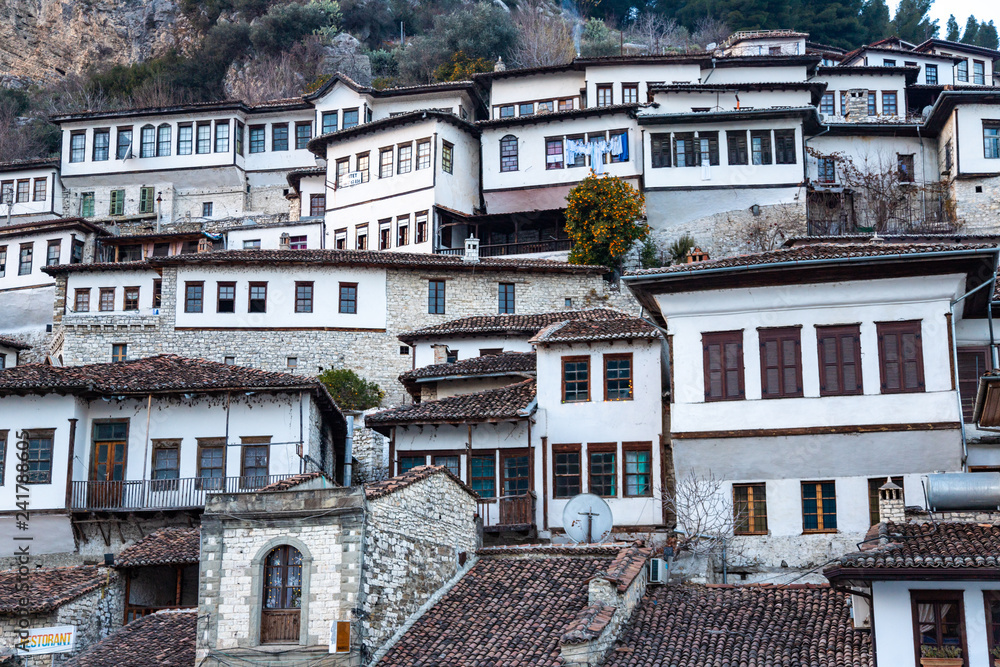 traditional ottoman houses in Berat  (mangalem district) with hiditional ottoman houses in Berat  (mangalem district) with his thousand windows.  An UNESCO world heritage site in Albania.