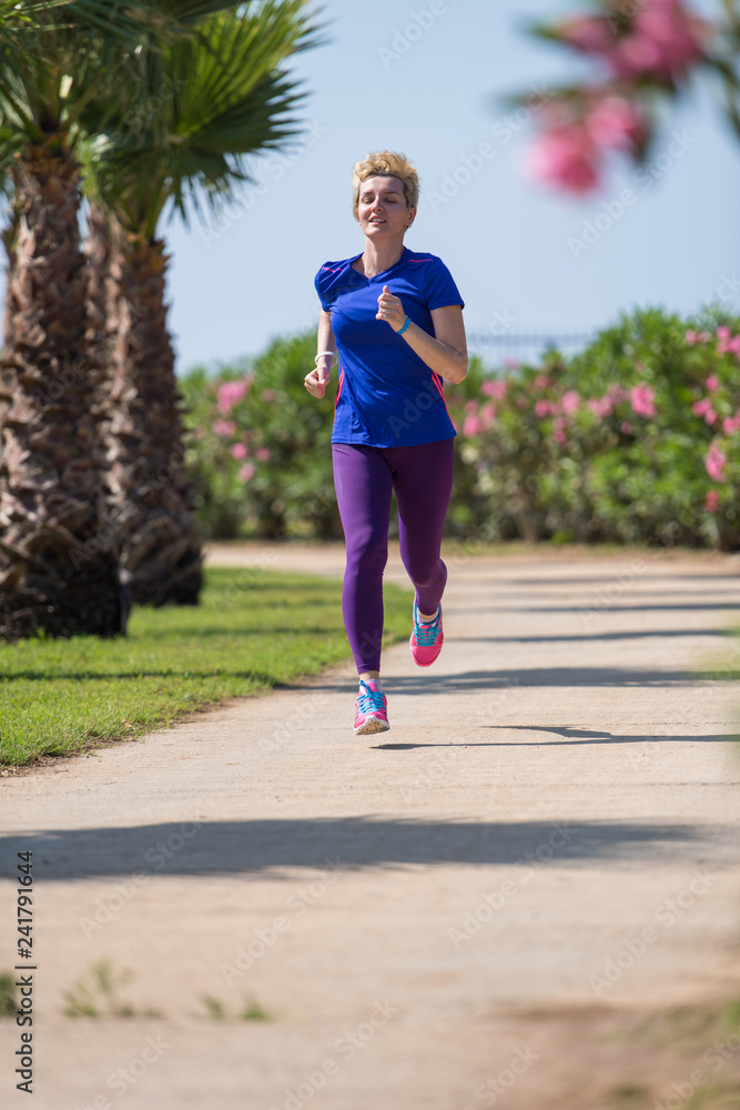 young female runner training for marathon young female runner training for marathon