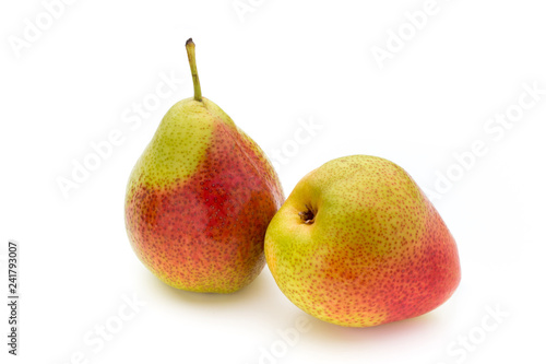 Fresh bio pear with leaves on isolated white background.