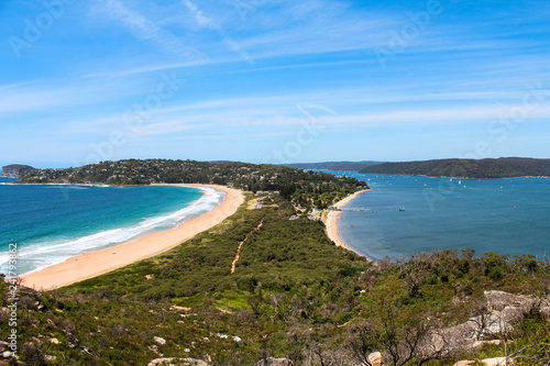 Palm Beach in Sydney as seen from Barrenjoey Head viewpoint on a clear summer day with perfect beach views (Sydney, Australia)