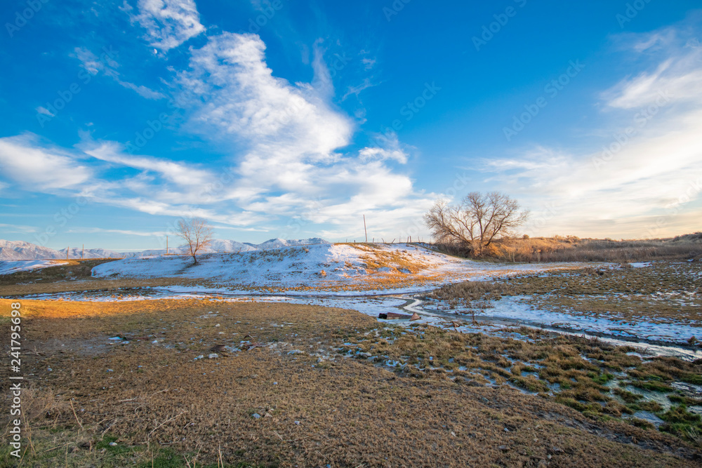 winter landscape with stream and blue sky winter landscape with stream and blue sky