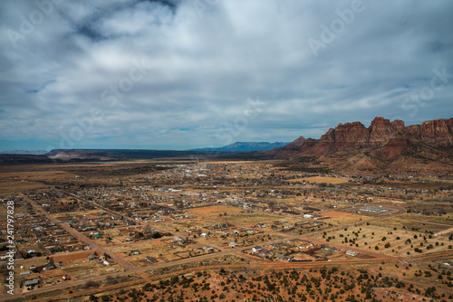 Aerial view of desert town on a cloudy day; Hildale and Colorado City, Utah and Arizona State line