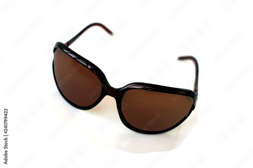 Sunglasses, on white background close up, protection from sunlight in clear weather Sunglasses, on white background close up, protection from sunlight in clear weather