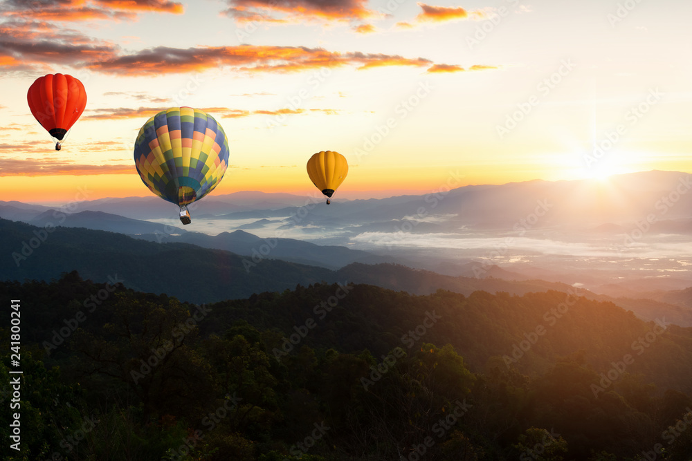 Sunset Mountain View has a floating balloon in the sky. Sunset Mountain View has a floating balloon in the sky.