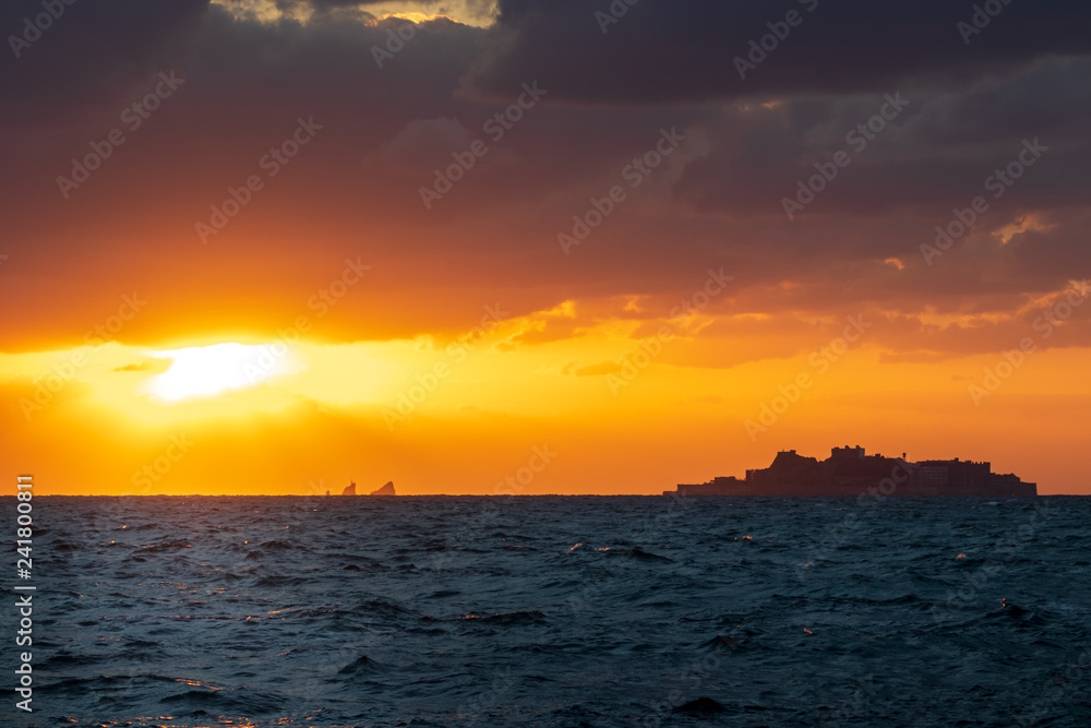 長崎の軍艦島と夕陽