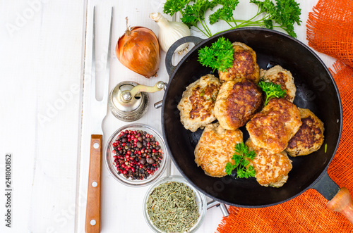 Dishes from meat. Cutlets in frying pan