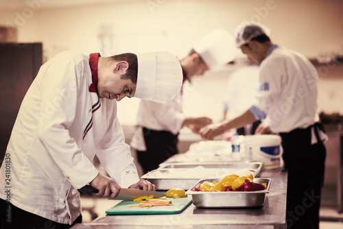 Chef cutting fresh and delicious vegetables