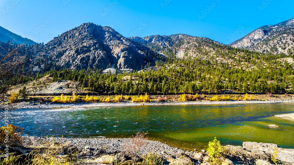 Fall colors surrounding the Thompson River at Goldpan Provincial Park on the Fraser Canyon route of the Trans Canada Highway, Highway 1, in British Columbia Canada
