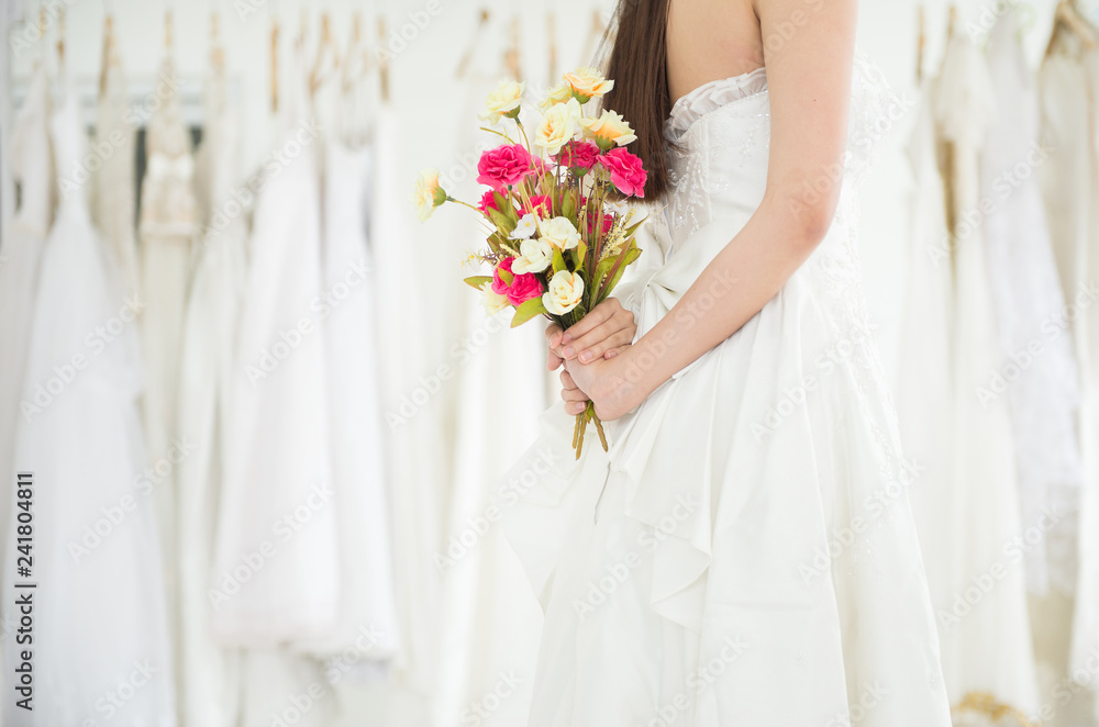 Bride holding a bouquet on hand for wedding,Beautiful asian woman,Romantic and sweet moment Bride holding a bouquet on hand for wedding,Beautiful asian woman,Romantic and sweet moment
