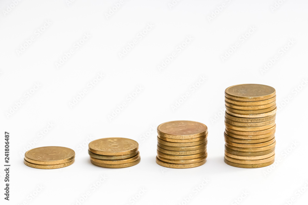 Close up view of stacked indian 5 rupees coins on white background. Close up view of stacked indian 5 rupees coins on white background.