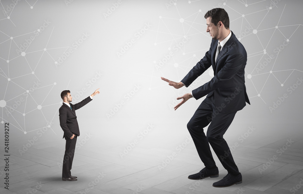 Small businessman aiming at a big businessman with connection and network concept
Small businessman aiming at a big businessman with connection and network concept