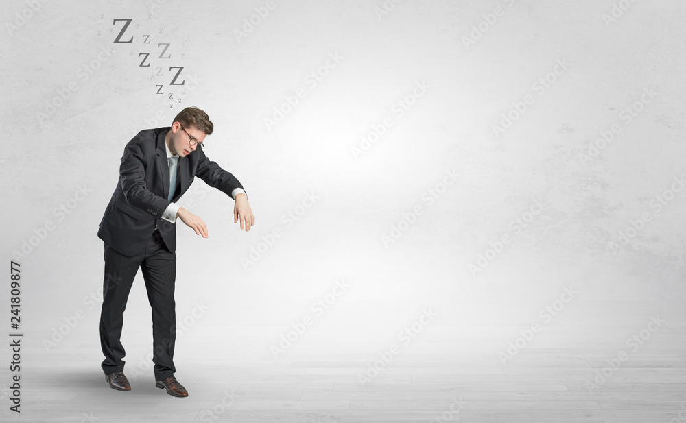 Tired businessman with sleeping sickness going somewhere
Tired businessman with sleeping sickness going somewhere