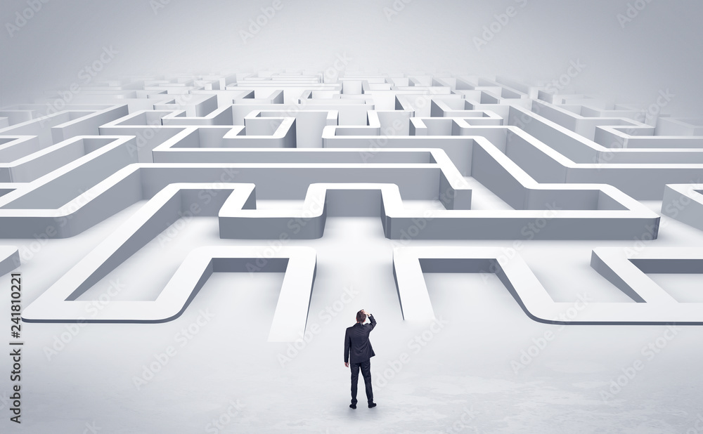 Businessman getting ready to enter a 3D flat labyrinth concept
Businessman getting ready to enter a 3D flat labyrinth concept