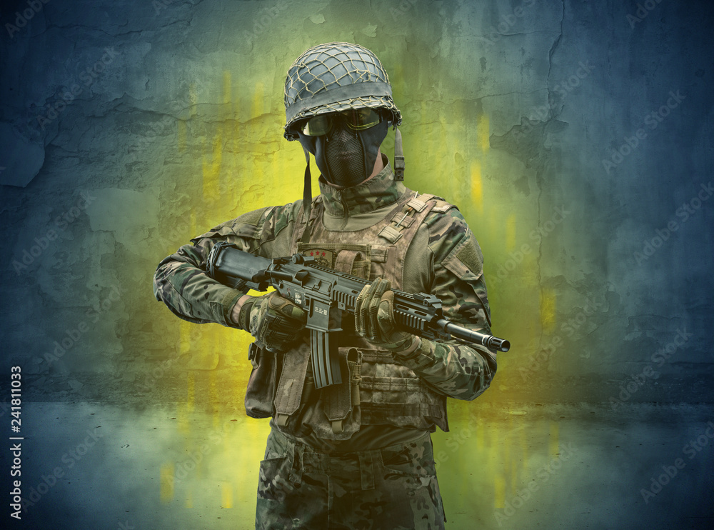 Hazard, menace soldier in a ruined crumbly building with arms on his hand
Hazard, menace soldier in a ruined crumbly building with arms on his hand