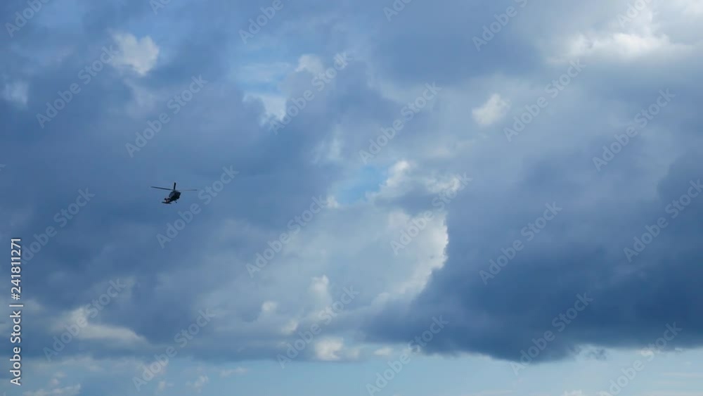 Helicopter heading and landing on an offshore oil rig , service travel to oil and gas platform and drilling rig in offshore locations Helicopter heading and landing on an offshore oil rig , service travel to oil and gas platform and drilling rig in offshore locations